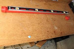 lot 243 image: Empire 48-Inch Level with Red Plastic Frame