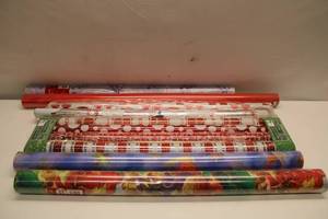 lot 277 image: Assortment of 7 Packaged Holiday Gift Wrapping Rolls - Various Designs