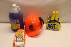 lot 310 image: Husqvarna Safety Gear Set Hard Hat, Work Gloves, Antifreeze, and Cleaner