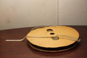 lot 314 image: Vintage Mechanical Film Spool with Clips