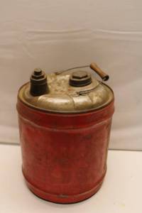 lot 319 image: Vintage 5 Gallon Red Fuel Can with Metal Lid and Handle