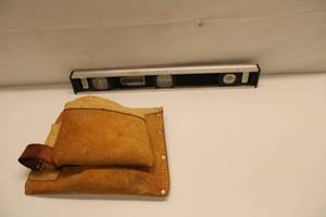 lot 338 image: Group of 3 Construction Tools - Leather Tool Pouch, Level, and Utility Knife