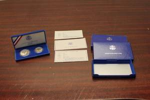 lot C-344 image: Set of 2 1986 United States Liberty Coins - Ellis Island & Statue of Liberty