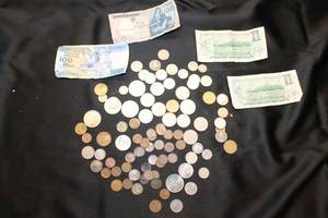 lot C-507 image: Large Assortment of International Coins and Currency Notes
