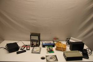 lot 519 image: Variety of Electronic Components and Accessories - Includes Hard Drive Adapter, RAM, and More