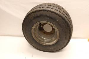lot 552 image: Used 16x8.5-8 Tire with Rim - Sports Tire