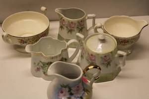 lot 556 image: Set of 6 Vintage Floral Porcelain Creamers and Sugar Bowl