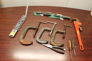 lot 596 image: Assortment of Hand Tools - Includes Clamps, Pliers, Wrench, and More