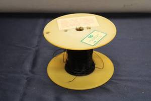 lot 708 image: Vintage Electrical Wire on Reel, Black - 27 AWG