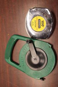lot 839 image: Set of 2 Measuring Tapes - Green 25ft and Silver 100ft