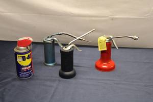 lot 744 image: Group of 4 Oil Cans including WD-40 and Vintage Nozzles