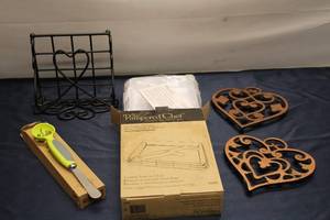 lot 804 image: Pampered Chef Cooking Set Avocado Tool, Heart Trivet Set, and Coating Tray with Tool