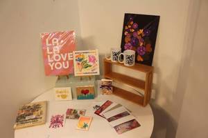 lot 71 image: Art and Decor Collection with Mugs and Books
