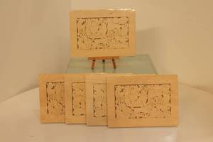 lot 89 image: Linnell Design Wooden Dog Art Puzzles - Set of 5