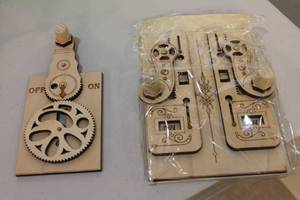 lot 165 image: Steampunk Wooden Gear Light Switch Covers Set