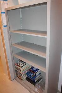 lot 203 image: Metal Bookshelf with Books Assortment