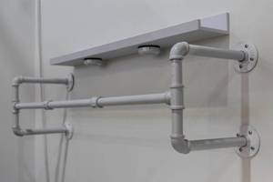 lot 209 image: Industrial Style Wall-Mounted Clothing Rack