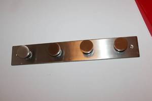 lot 221 image: Stainless Steel and White Coat Hooks Set