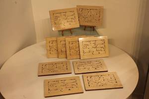 lot 102 image: Linnell Design Wooden Animal Puzzles - Set of 10