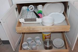 lot 316 image: Kitchen Utensils and Dinnerware Set with Storage Canister