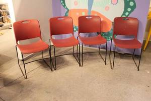 lot A-330 image: Set of 4 Red Stackable Plastic Chairs with Metal Frames