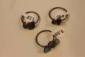 lot 338 image: Set of Three Copper Rings with Stone Accents