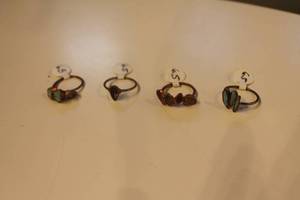 lot 342 image: Set of Four Copper Rings with Green Stones