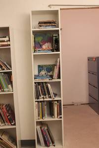 lot 422 image: Collection of Childrens and Art Books on White Bookshelf
