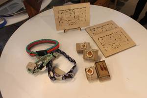 lot 430 image: Lot of Wooden Animal Puzzles, Handmade Earrings, and Braided Collars