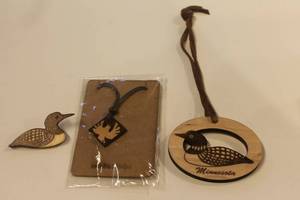 lot 378 image: Minnesota Loon Wooden Ornament and Pendant Set
