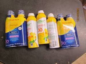 7 cans of spray on sun screen...