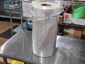 lot 27 image: Large Roll of Clear Plastic Shrink Wrap