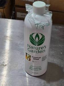 lot 142 image: Tropical Blast Fragrance Oil by Natures Garden Approx. Near Full