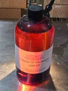 lot 187 image: Treasure Of The Amazon Fragrance Oil - 16 oz Approx.  Near Full