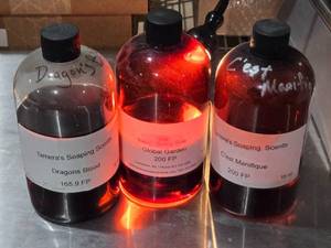 lot 202 image: Lot of Tameras Soaping Scents - Dragons Blood, Global Garden, Cest Magnifique Approx 14 - 12 Full per bottle.