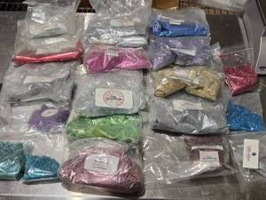lot 432 image: Lot of Assorted Glitter in Various Colors - All partially used.
