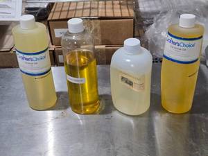 lot 434 image: Assorted Oils Lot - Walnut, Jojoba, Macadamia, Canola - All better than 12 full.