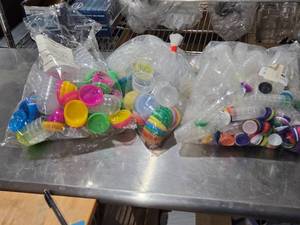 lot 549 image: Lot of Plastic Containers with Colorful Lids - Vending Containers