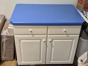 lot 558 image: White Utility Cabinet with Blue Top