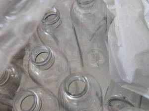 lot 582 image: Bulk Lot of 8 oz Clear PET Cosmo Round Bottles