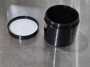 lot 589 image: 4 oz Black Polypropylene Double Wall Jars Box is about 14 Full
