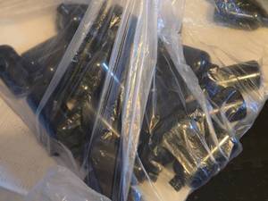 lot 599 image: Bulk Lot of Black Plastic Bottles