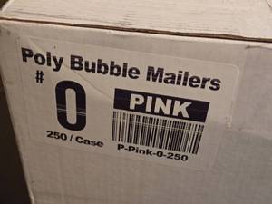 lot 606 image: Poly Bubble Mailers #0 Pink Approx 6.5 x 9  250Case - Box is Approx. 34 Full