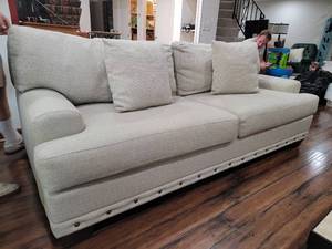 lot 5 image: Basset Oatmeal Two Cushion Sofa Couch,as