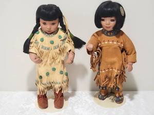 lot 66 image: Danbury Mint Native American Doll Pair - Elke Hutchens - Gentle Shepherd  Children of the Plains