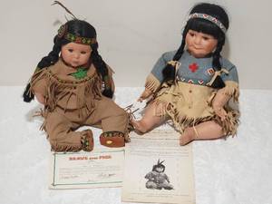 lot 67 image: Danbury Mint Native American Doll Pair - Elke Hutchens - Brave and Free  Song of the Sioux