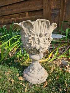 lot 86 image: Cherub Adorned Resin Footed Urn
