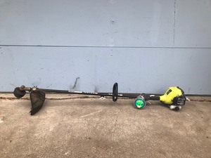 lot 8 image: Ryobi Full Crank 2 Cycle Gas Operated Weed Whip with a Extra Spool of Line