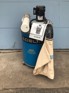 lot 7 image: Delta 35 Gallon Dust Collector on Wheels