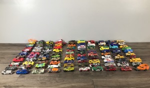 lot 27 image: Lot of 100 Matchbox  Hot Wheels Die Cast Cars